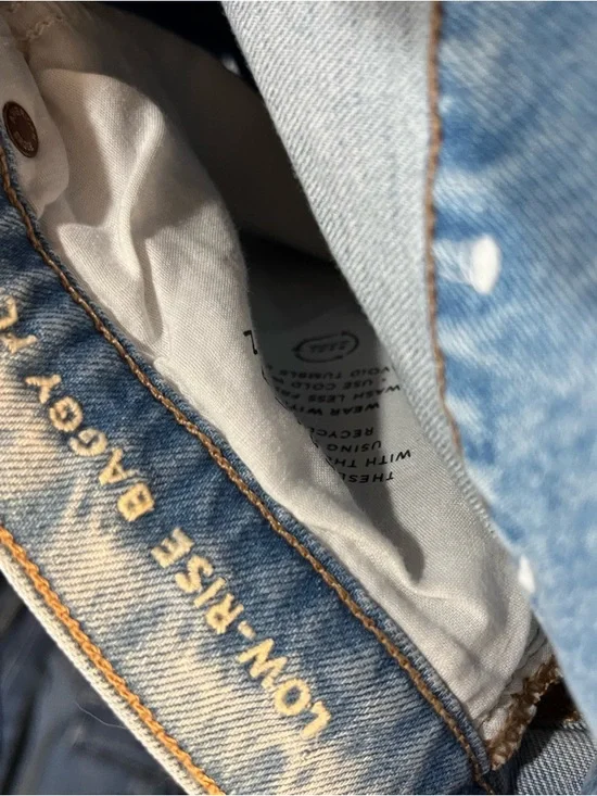 American Eagle Dreamy Drape Low Rise Flare Leg Jeans in Blue - Picture 13 of 14